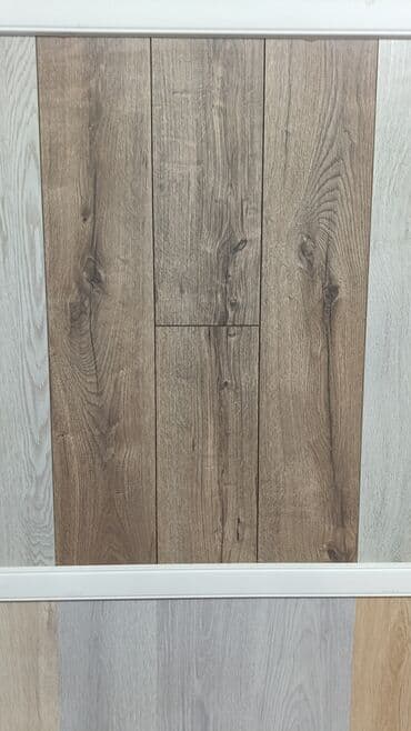 Ламинат: Məhsul: Laminat döşəmə örtükləri və aksesuarları Təsvir: - Mağazada — 7