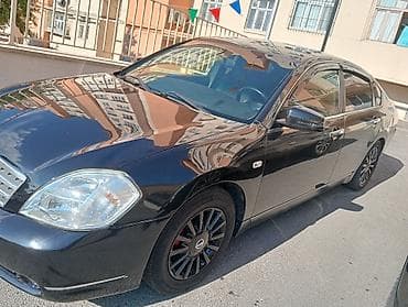 man sat: Nissan Teana – qara rəngli, geniş və komfortlu sedan. Xüsusiyyətlər — 3