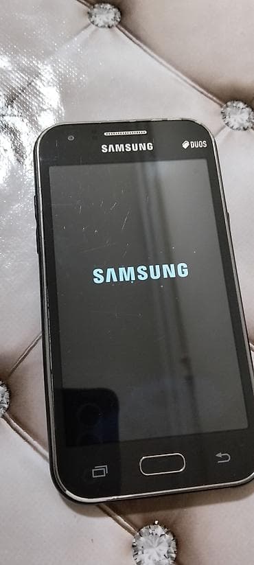 micro qulaqciq: Samsung Galaxy J1, 4 GB, rəng - Qara, İki sim kartlı — 7