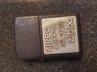 Toy paltarları və aksesuarları: Məhsul: Zippo benzinli alışqan Təsvir: - Klassik Zippo mexanizmi ilə — 2