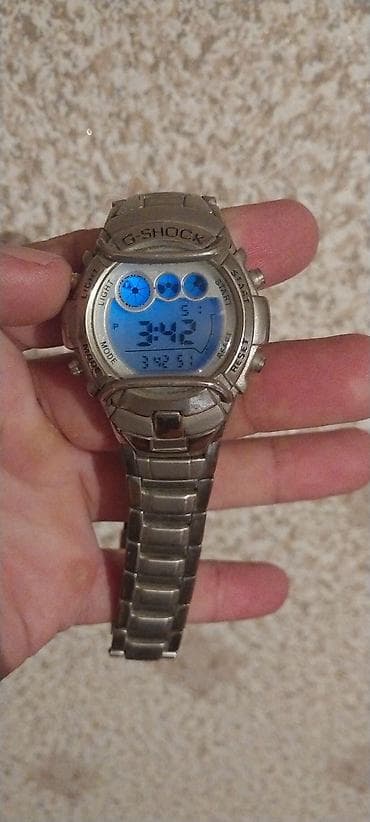 saatlar: Casio G‑Shock rəqəmsal qol saatı - Korpus və qayış: metal — 4