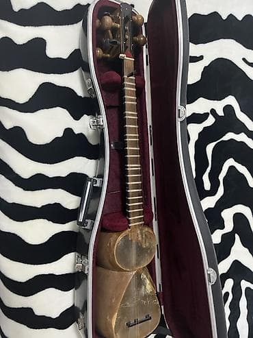 zerb aleti: Tar - Milli simli musiqi aləti, klassik formalı. - Korpus: bütöv — 2