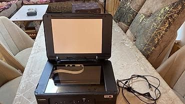 Canon MegaTank G2400 çoxfunksiyalı printer/skaner/kopiya aparatıdır — 2