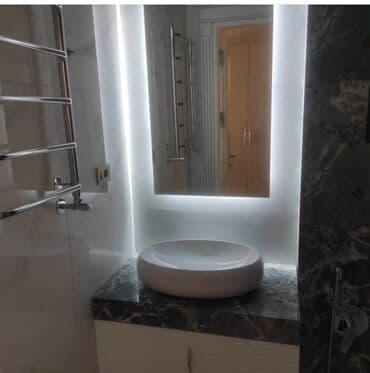 hamamlar: Ağ rəngdə, oval formalı, dəbli lavabo. Dolablı və boz mərmər başlıqlı — 3