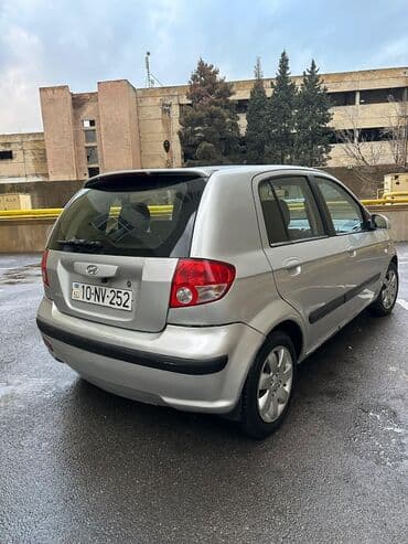 диски на 15 на ниву: Hyundai Getz, gümüşü rəng Texniki xüsusiyyətlər: - Yanacaq növü — 2