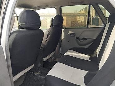 qazel yuk maslnl: Ağ rəngli sedan. Texniki və xarici xüsusiyyətlər: - 4 qapı, 5 yerlik — 8