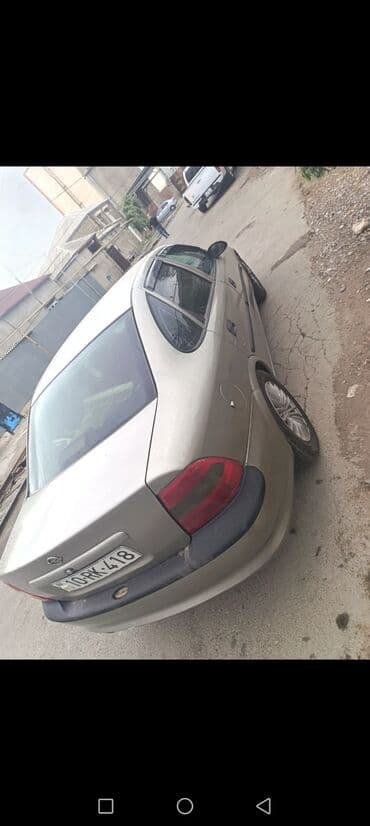 masinim var ag rengi: Opel sedan – komfortlu və praktik gündəlik minik avtomobili. - Kuzov — 3