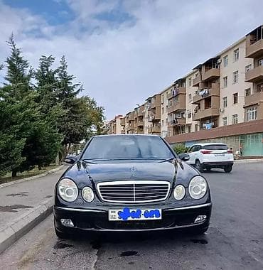 Mercedes-Benz E 320: 3.2 л | 2003 г. Седан