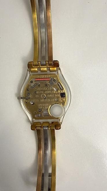 Qol saatı, Swatch, rəng - Qızılı