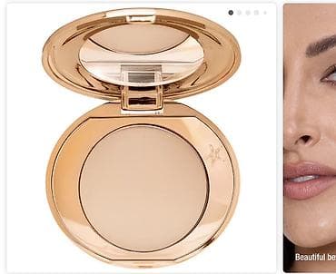 Kompakt pudra – qızılı metalik qablaşdırmada, aynalı açılan qapaqlı