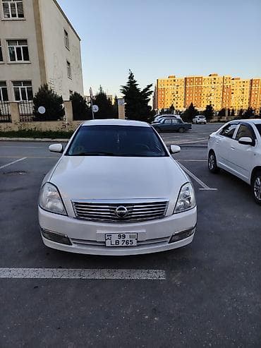 tesla model 3: Nissan Teana: 2.3 l | 2005 il Sedan — 2