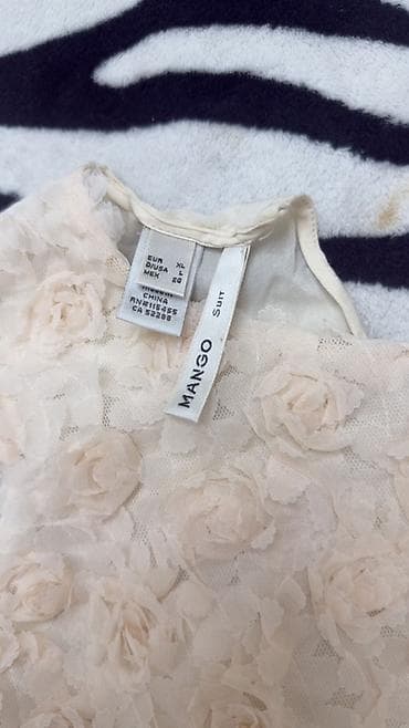 eros krem: Mango Suit qadın bluzası - Model: qolsuz, dairəvi yaxalı - Rəng: açıq — 2