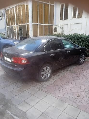 kia optima 2011: Kia Optima: 2 l | 2006 il Sedan — 3