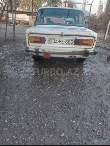 07 maşınlar: Ağ rəngli VAZ-2106 avtomobili. Avtomobilin dörd dairəvi fənəri, qara — 5