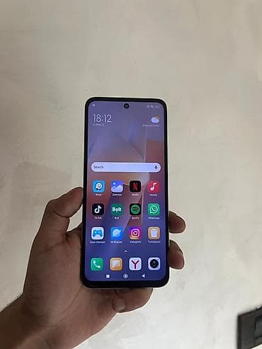 telefon bakı: Redmi 12, 128 GB, rəng - Boz, Barmaq izi, Face ID — 6