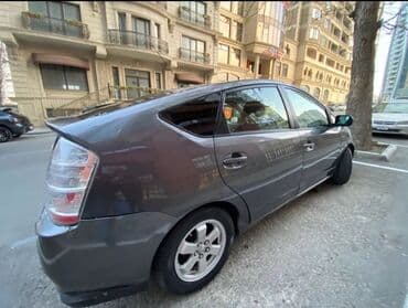 bmw x7 2009: Toyota Prius (2-ci nəsil) hibrid hetçbek - Gümüş-boz rəng (dark — 4