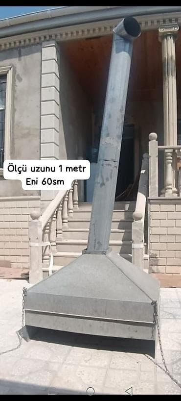 soba borusu: Metaldan hazırlanmış tüstü çıxaran baca “şapkalı” başlıq/örtük — 1