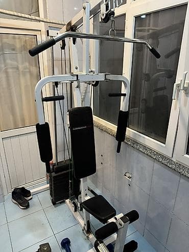 Çoxfunksiyalı ev trenajoru – çəkilər sistemi ilə Xüsusiyyətlər: - Üst