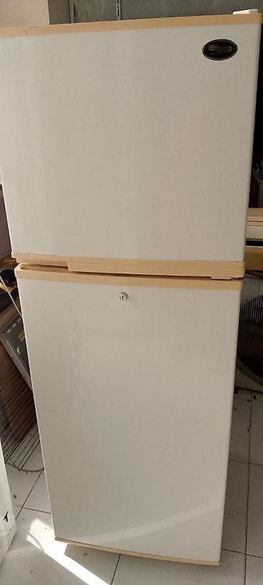 ipad satilir: İki qapılı soyuducu (üst qapı – dondurucu, alt qapı – soyuducu bölmə) — 1