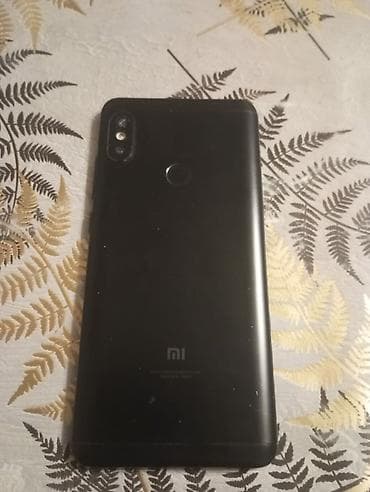 ucuz qaz peci: Xiaomi Mi5, 32 GB, rəng - Qara, 
 Sensor, Barmaq izi, Face ID — 1