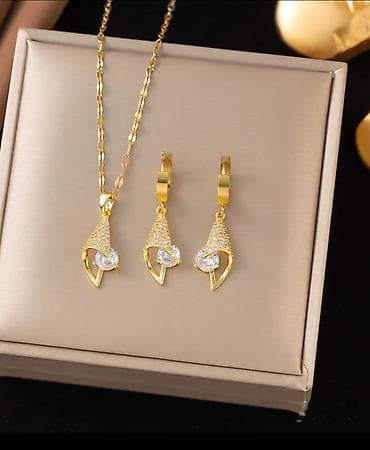 18 karat qızıl suyuna salinib rəngi getmir Qızılı rəng zərgərlik dəsti