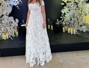 Qara rəngli, uzun ətəkli, zərif naxışlarla bəzədilmiş ziyafət donu lalafo.az -da Qara rəngli, uzun ətəkli, zərif naxışlarla bəzədilmiş ziyafət donu