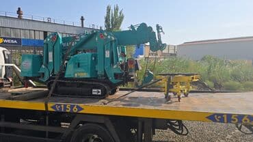 Evakuatorlar: Şəkillərdə görünən mini hörümçək kranı, məhdud əraziyə sahib tikinti — 2