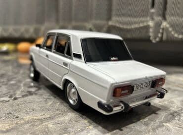 oyuncaq kamaz type 1: Modelka vaz 2106
İşıqları yanır dəmirdəndi — 1