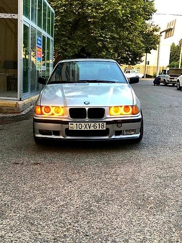 masin satisi: BMW 3 Series E36 sedan, gümüşü rəng. - Orijinal BMW emblem və M paket — 2