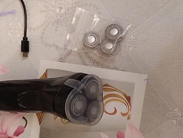 philips uz qirxan: Elektrik üz qırxan – 3 başlı fırlanan sistem - 3 ədəd fırlanan kəsici — 1