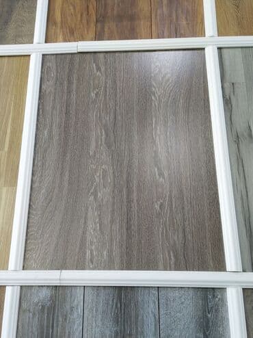 pol ucun taxta qiymeti: Ağac naxışlı laminat döşəmə örtüyü. Bu örtük evdə, ofisdə və ya digər — 1