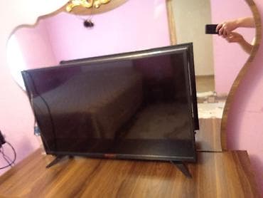 LED televizor - Ekran: təxminən 32–40 düym arası, nazik çərçivə -