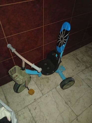 Uşaq üçtəkərli velosipet.normal veziyetdedi