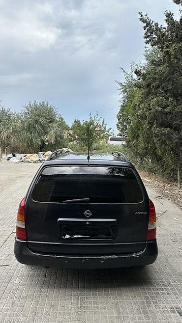 opel zafira a: Opel Astra: 2 l | 1998 il 437306 km Universal — 7