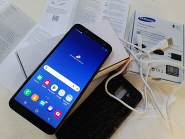 штатив для фотоаппарата бу: Samsung Galaxy J6, 32 ГБ, цвет - Черный, Гарантия, Кнопочный, Сенсорный — 1