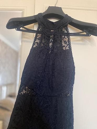 Digər qadın geyimləri: Razmer L Qara rəngdə qadın maksi donu. Donun bütün səthi naxışlı — 2