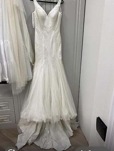 Свадебные платья и аксессуары: Oleq Cassini. Amerika brendidir. Parisdən alınıb. 3200 AZN. 1 dəfə — 1