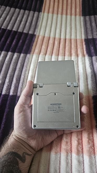 blu ray disk: Anbernic RG35XXSP — retro oyunlar üçün nəzərdə tutulmuş portativ (əl — 3