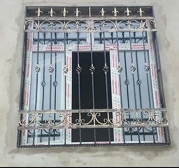 Pəncərələr üçün müxtəlif dizaynlarda dəmir barmaqlıqlar. Bu