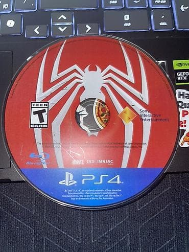 CD, DVD disklər: PS4 oyunu: Marvel’s Spider-Man (Insomniac Games) Cızıqı üst tərəfində — 4