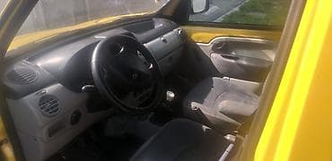 masin qaz: Renault Kangoo sarı rəngli yük/furqon avtomobili. Xüsusiyyətlər: - — 3
