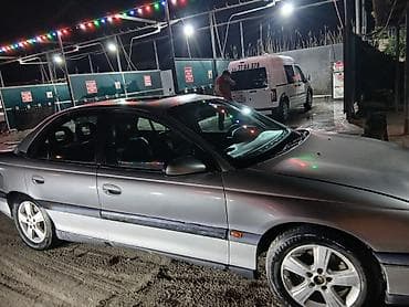 qazel radiator: Opel Omega: 2 l | 1996 il 300000 km Sedan — 6