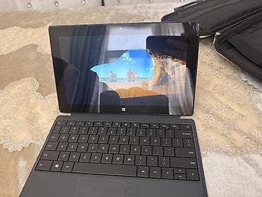 Digər noutbuklar və netbuklar: Microsoft Surface planşet-noutbuk hibridi Xüsusiyyətlər: - Ekran — 6