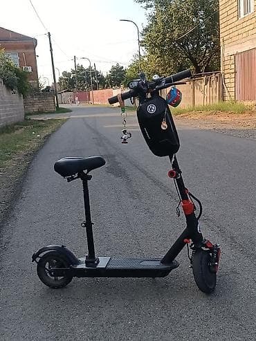 elektrikli sc: Elektrik skuter – oturacaqlı, amortizatorlu, gündəlik şəhər sürüşü — 1