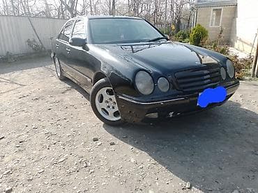 maşin niva: Mercedes-Benz E‑Class (W210) sedan, qara rəng. Xüsusiyyətlər: - — 3