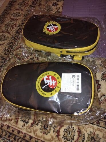 Шлемы: Məhsul: döyüş idmanları üçün zərbə yastığı (Thai pad) dəsti 1 ededi — 1