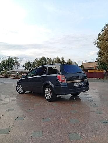winda teker evi: Opel Astra H Caravan (universal kuzov) - Kuzov: universal, 5 qapı - — 8