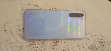 dilmanc rus azeri: Redmi smartfon - Model xətti: Redmi (ağ/mavi parıltılı arxa panel) - — 2