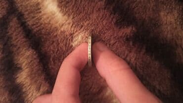 gerbli 10 qəpik: Salam 1922-ci ilin 50 qəpiklik sikkəsidi. Texminen 10 qramdi — 3