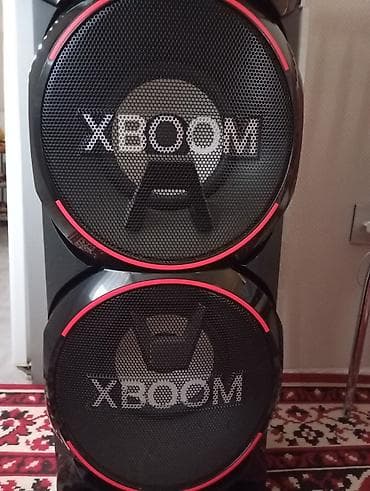 musiqi sentir: LG XBOOM partnyor səs sistemi - İki böyük ölçülü woofer ilə güclü — 2